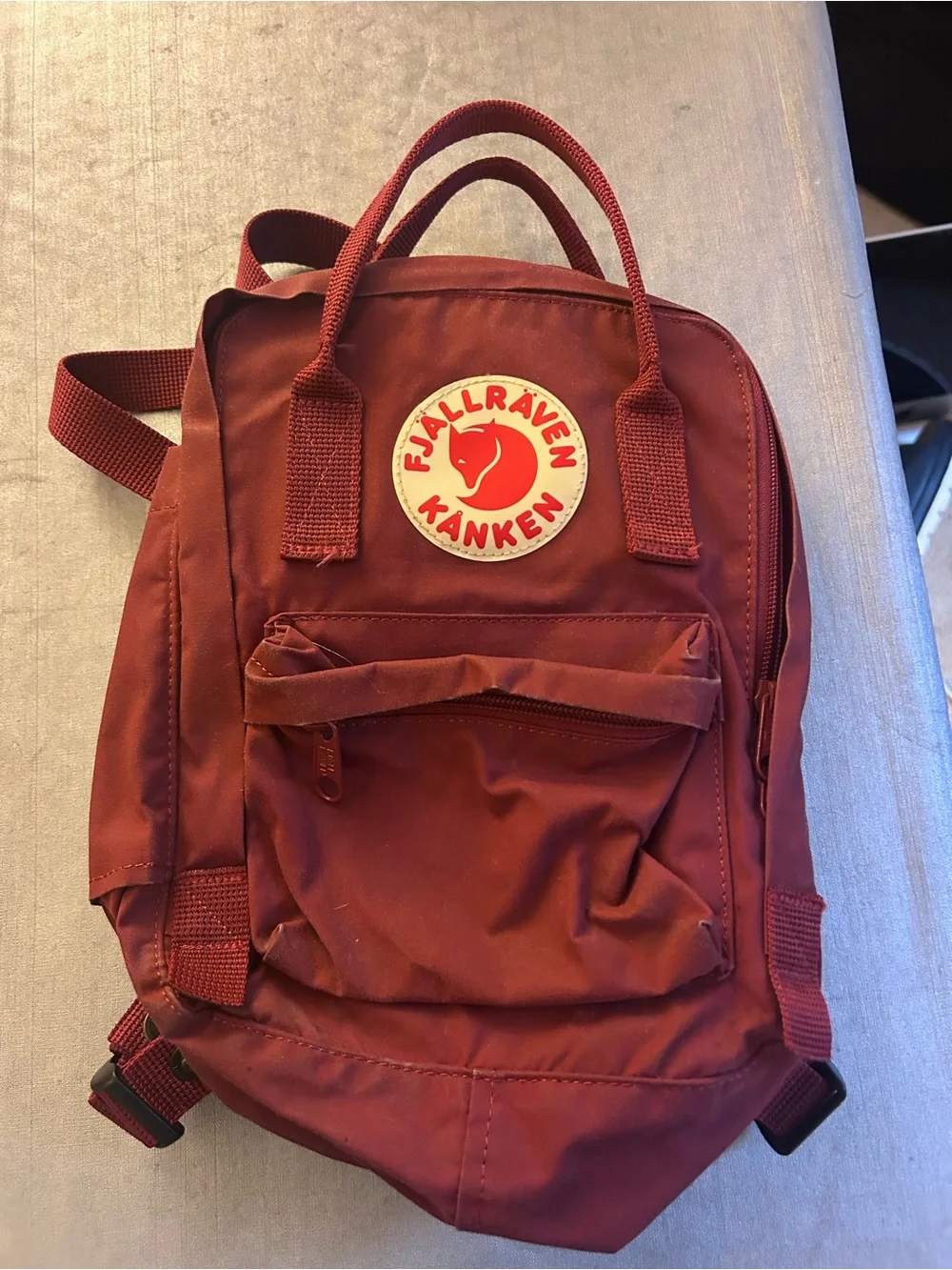 Fjallraven Kånken Mini Backpack in deep burgundy red